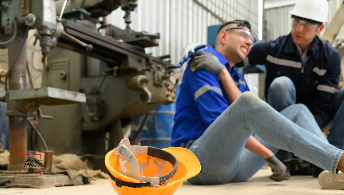 A worker helping an injured worker