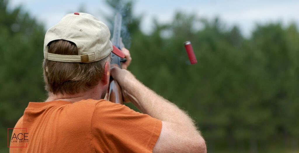 a man with a shot gun